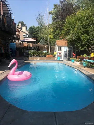 a view of a house with swimming pool