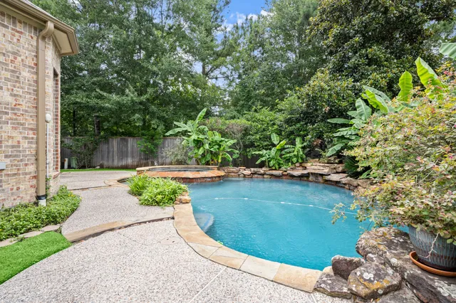 a view of a wooden floor with a lake view