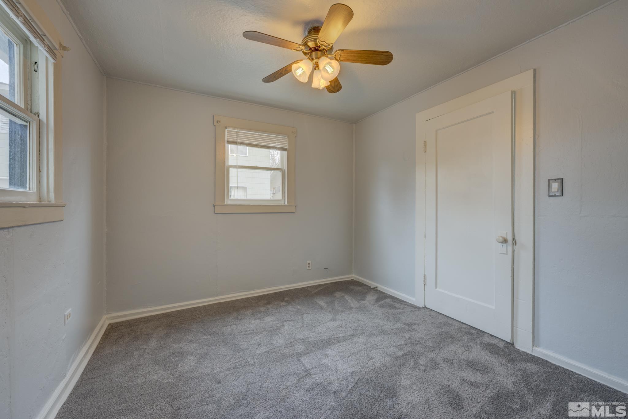 619 Thoma Street Reno, NV 89502 - Photo 22 of 40 a view of room with a ceiling fan and a window