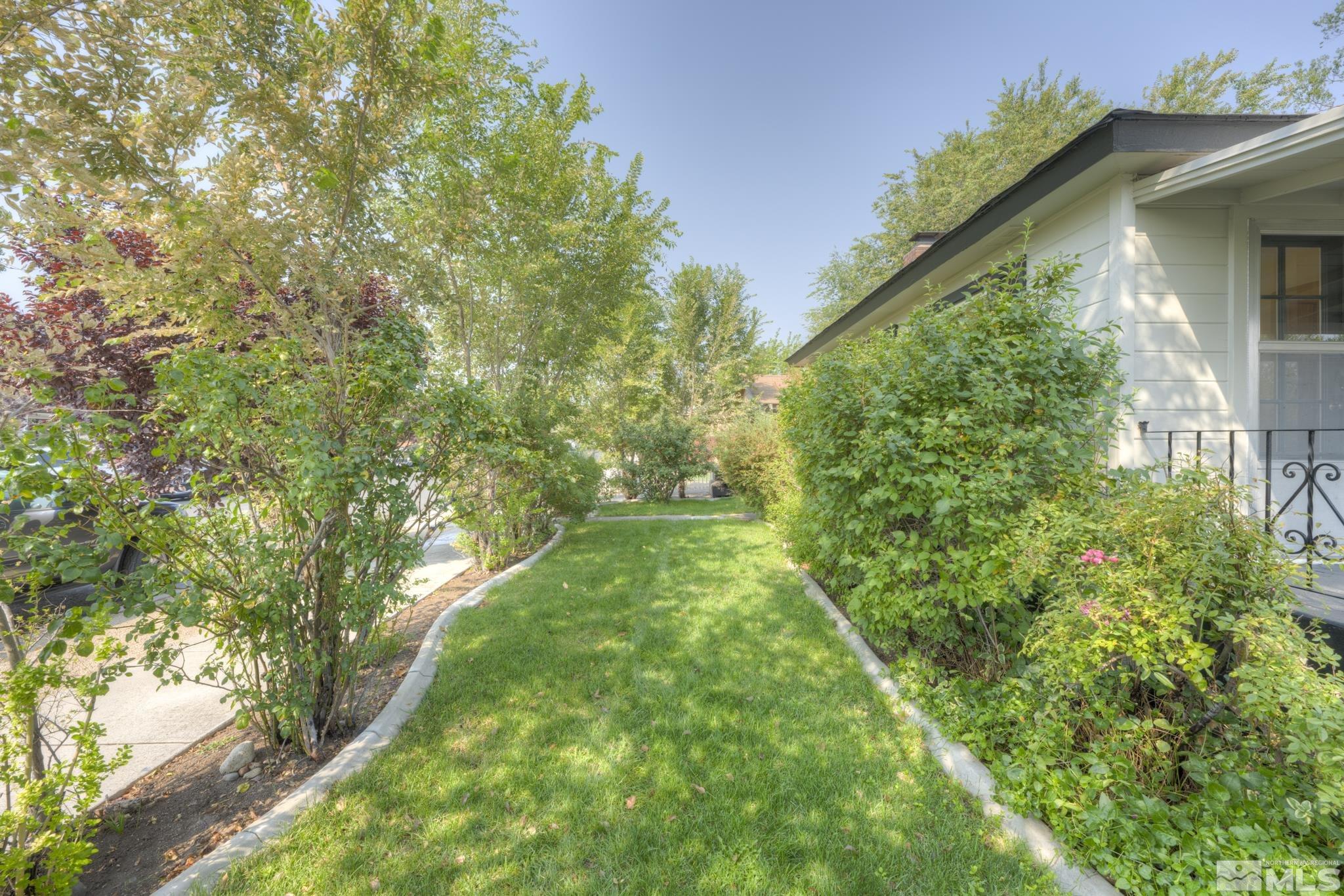 619 Thoma Street Reno, NV 89502 - Photo 25 of 40 a backyard of a house with lots of green space