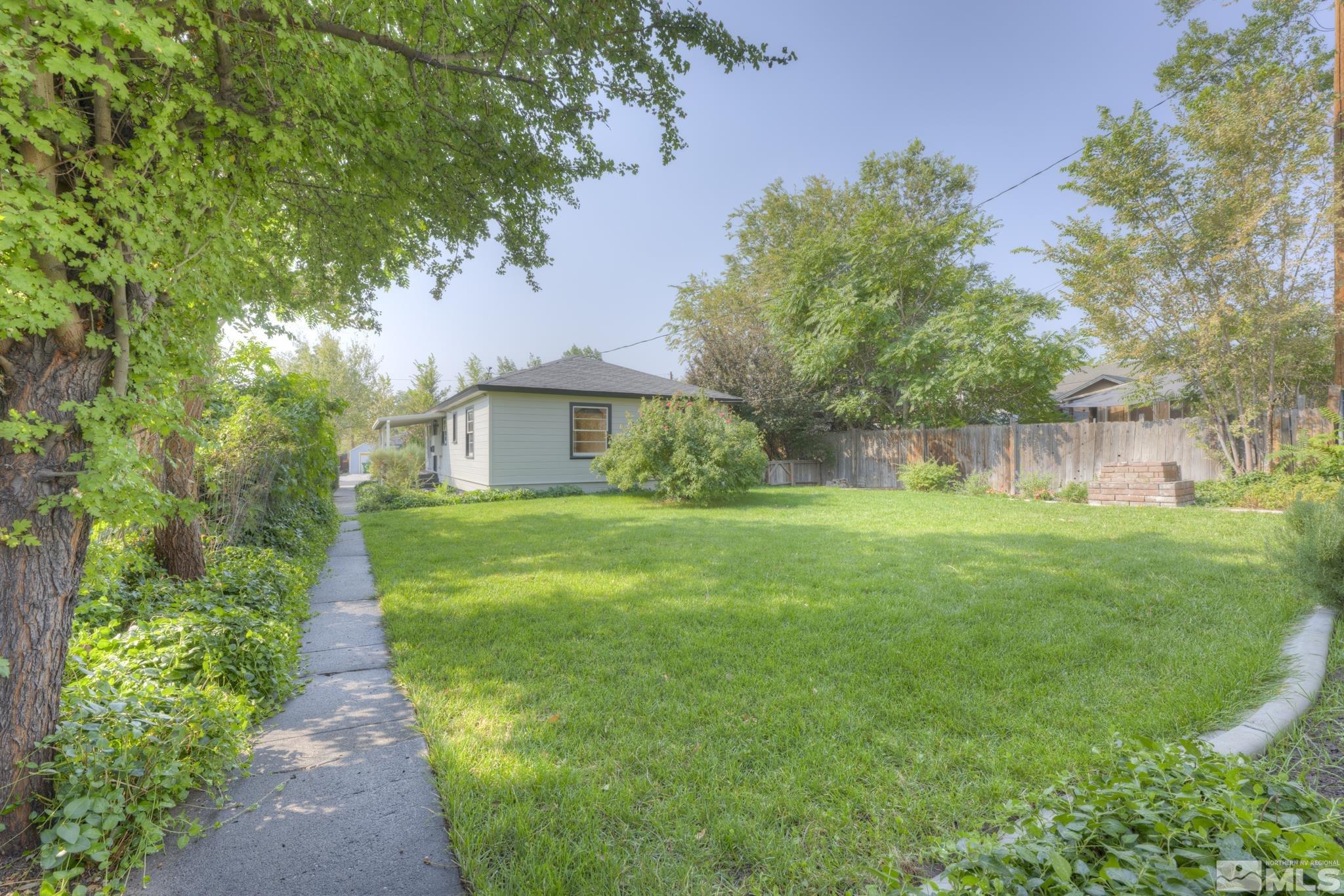 619 Thoma Street Reno, NV 89502 - Photo 28 of 40 a front view of a house with garden