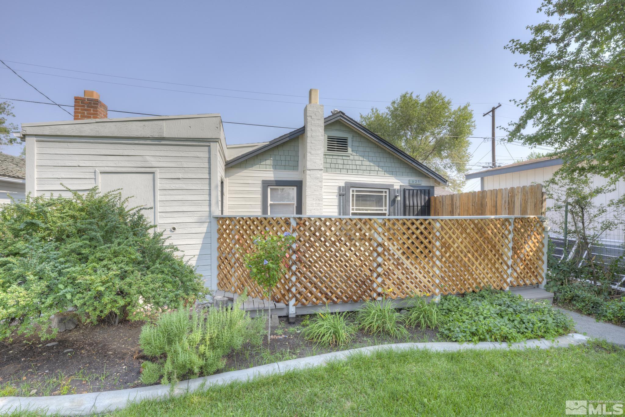 619 Thoma Street Reno, NV 89502 - Photo 31 of 40 a front view of a house with garden