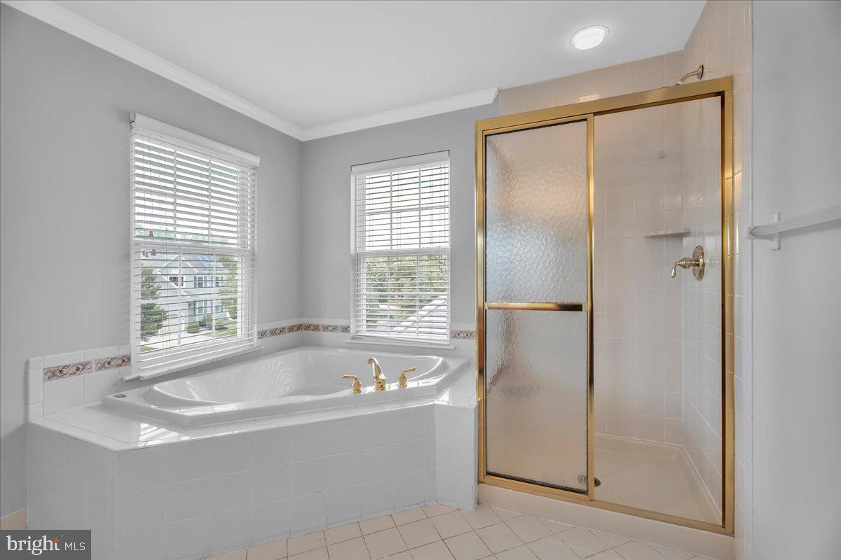 68 Hillside Lane Mount Laurel, NJ 08054 - Photo 26 of 36 a bathroom with a bathtub and a shower