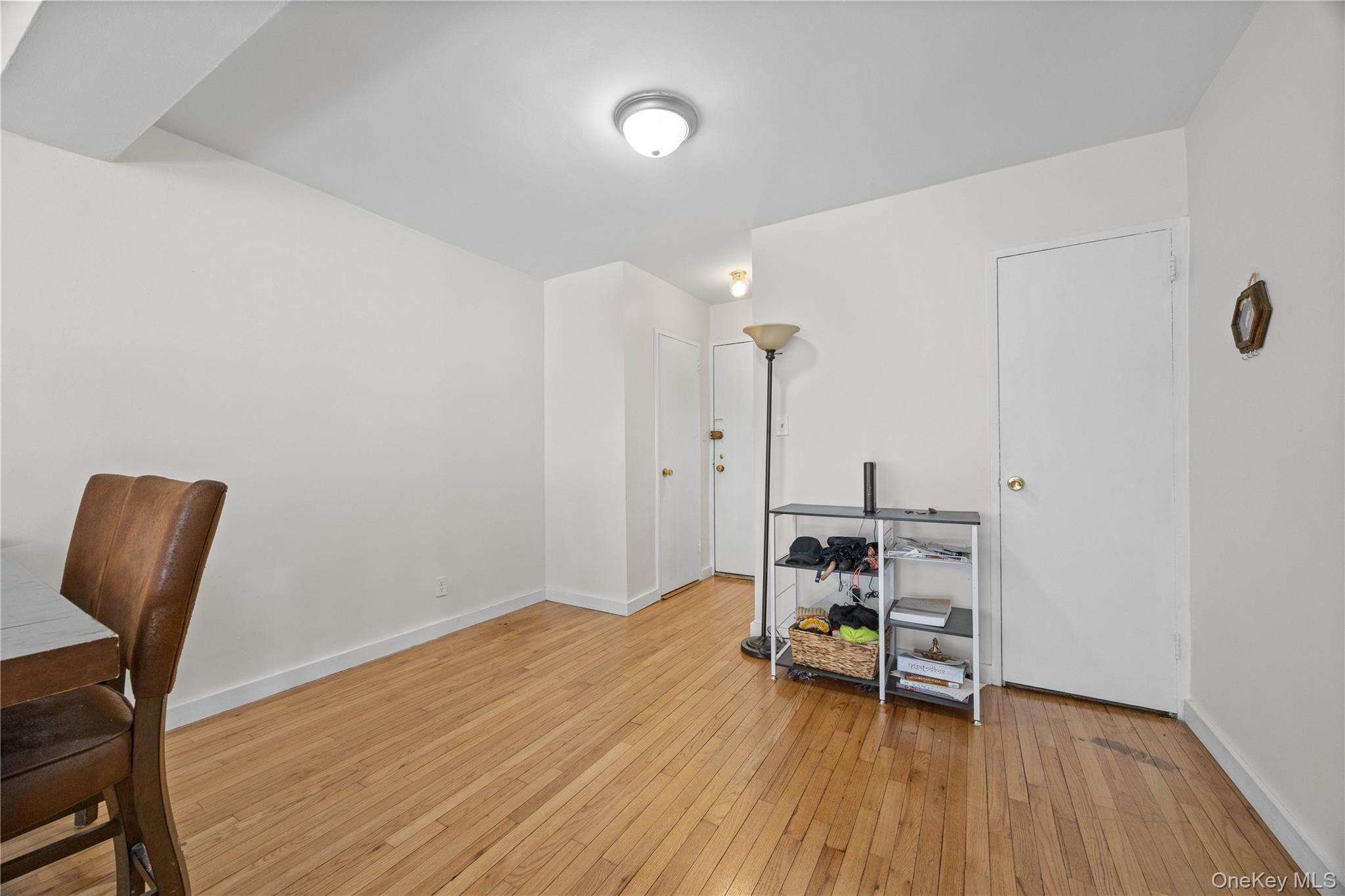 2736 Independence Avenue, Unit 4A Bronx, NY 10463 - Photo 15 of 31 a view of workspace with wooden floor and furniture