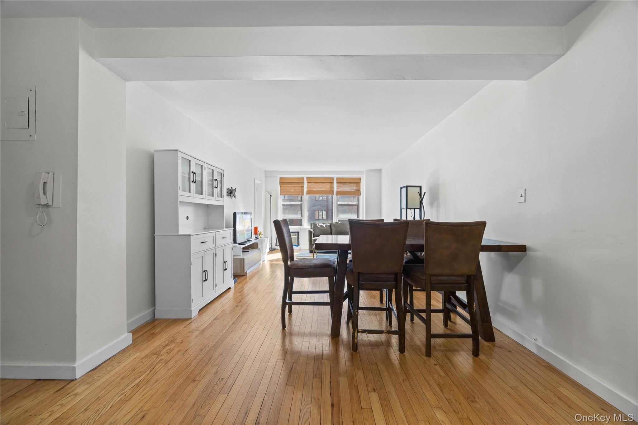 2736 Independence Avenue, Unit 4A Bronx, NY 10463 - Photo 17 of 31 a view of a dining room with furniture and wooden floor