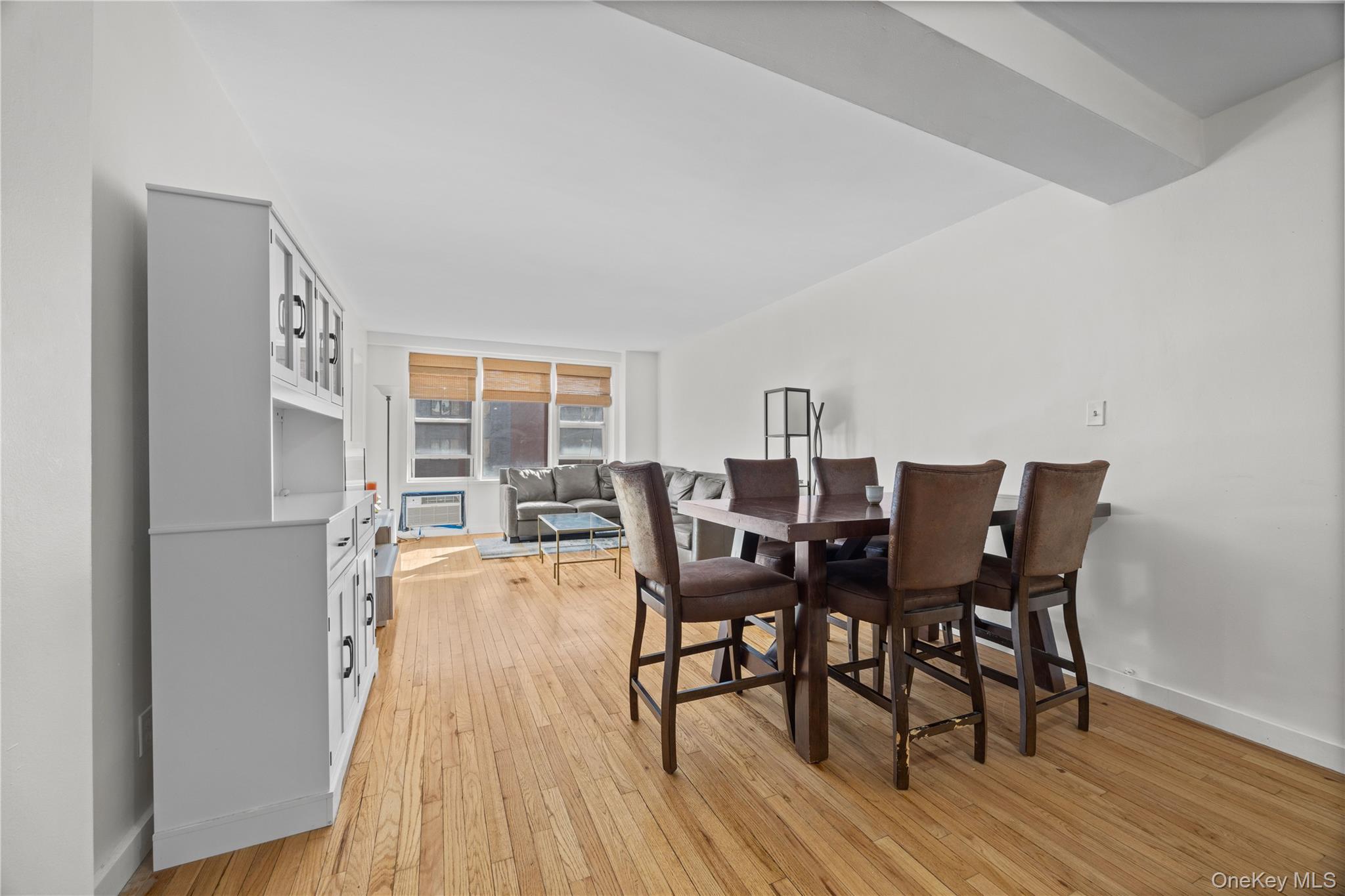 2736 Independence Avenue, Unit 4A Bronx, NY 10463 - Photo 18 of 31 a view of a dining room with furniture and wooden floor