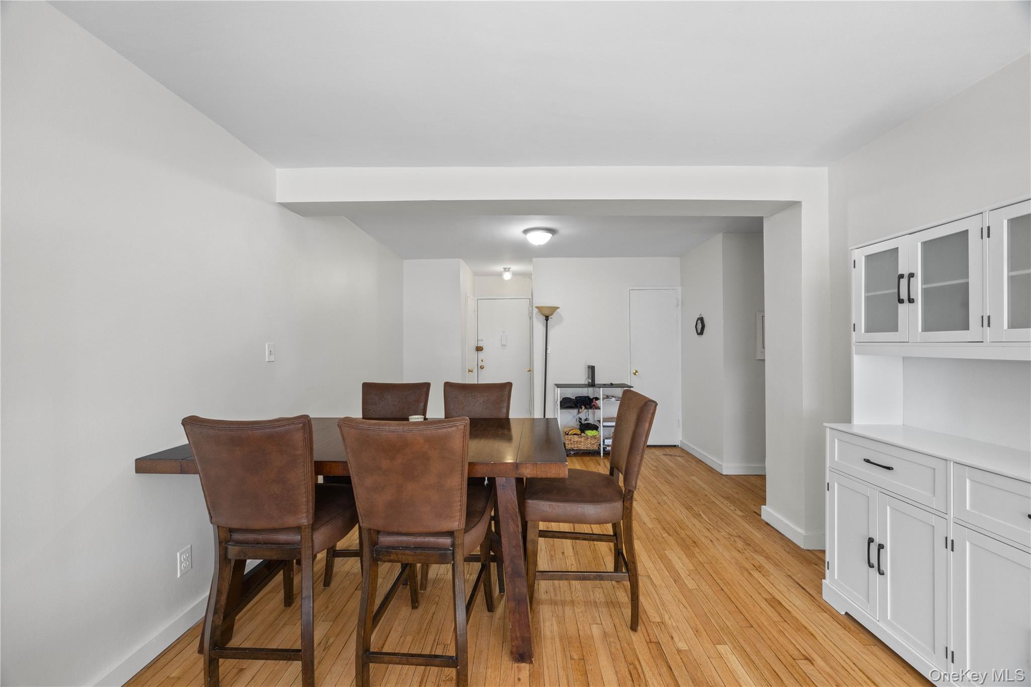2736 Independence Avenue, Unit 4A Bronx, NY 10463 - Photo 24 of 31 a view of a dining room with furniture and wooden floor