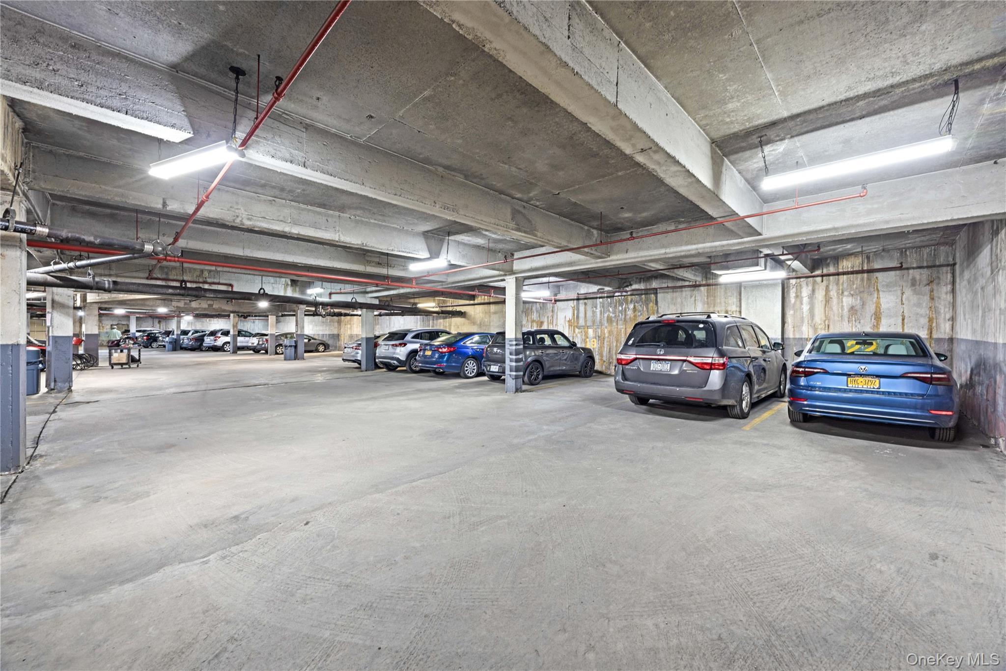 2736 Independence Avenue, Unit 4A Bronx, NY 10463 - Photo 26 of 31 a view of cars parked in a parking