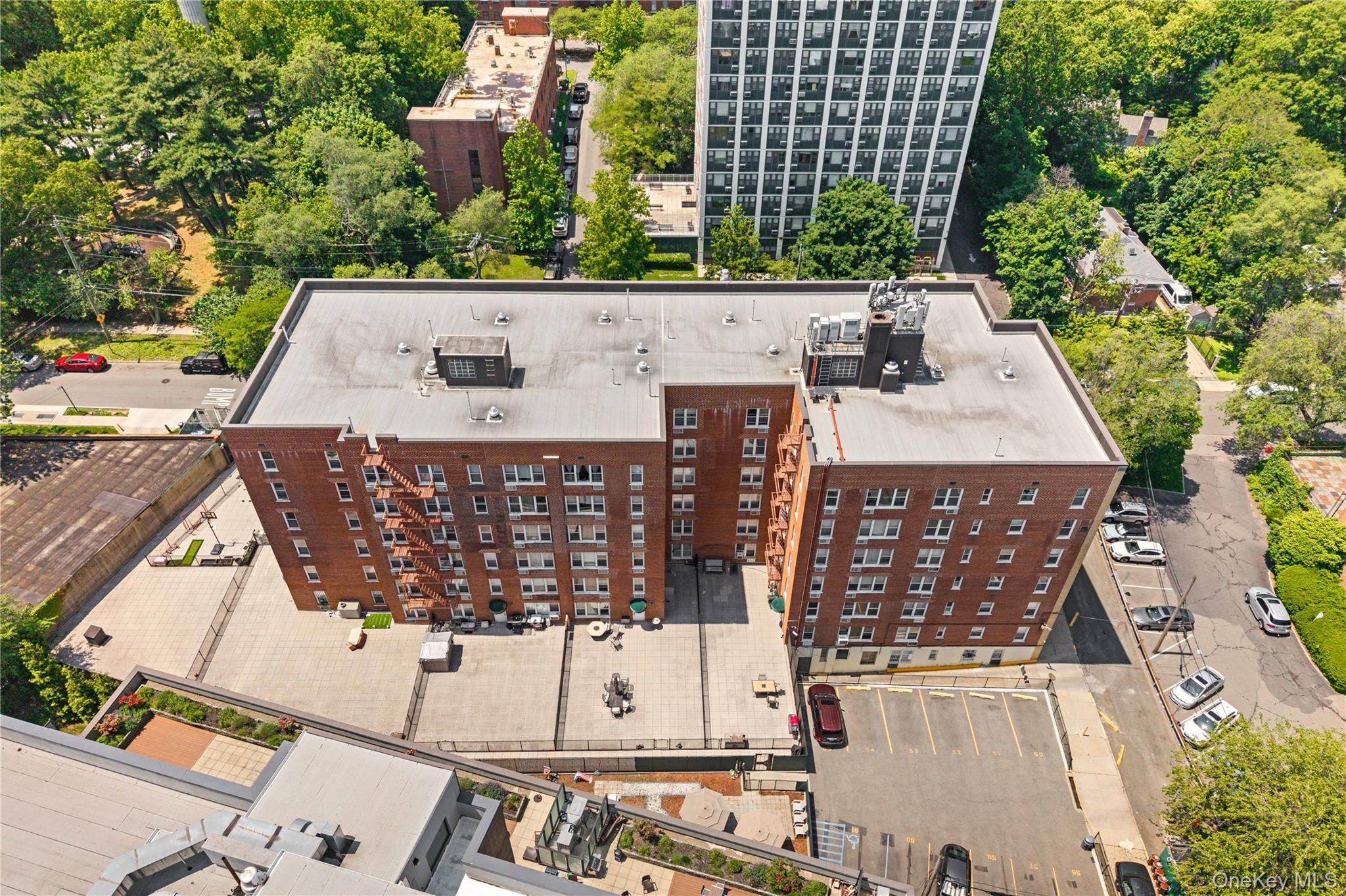 2736 Independence Avenue, Unit 4A Bronx, NY 10463 - Photo 27 of 31 an aerial view of a house with a garden