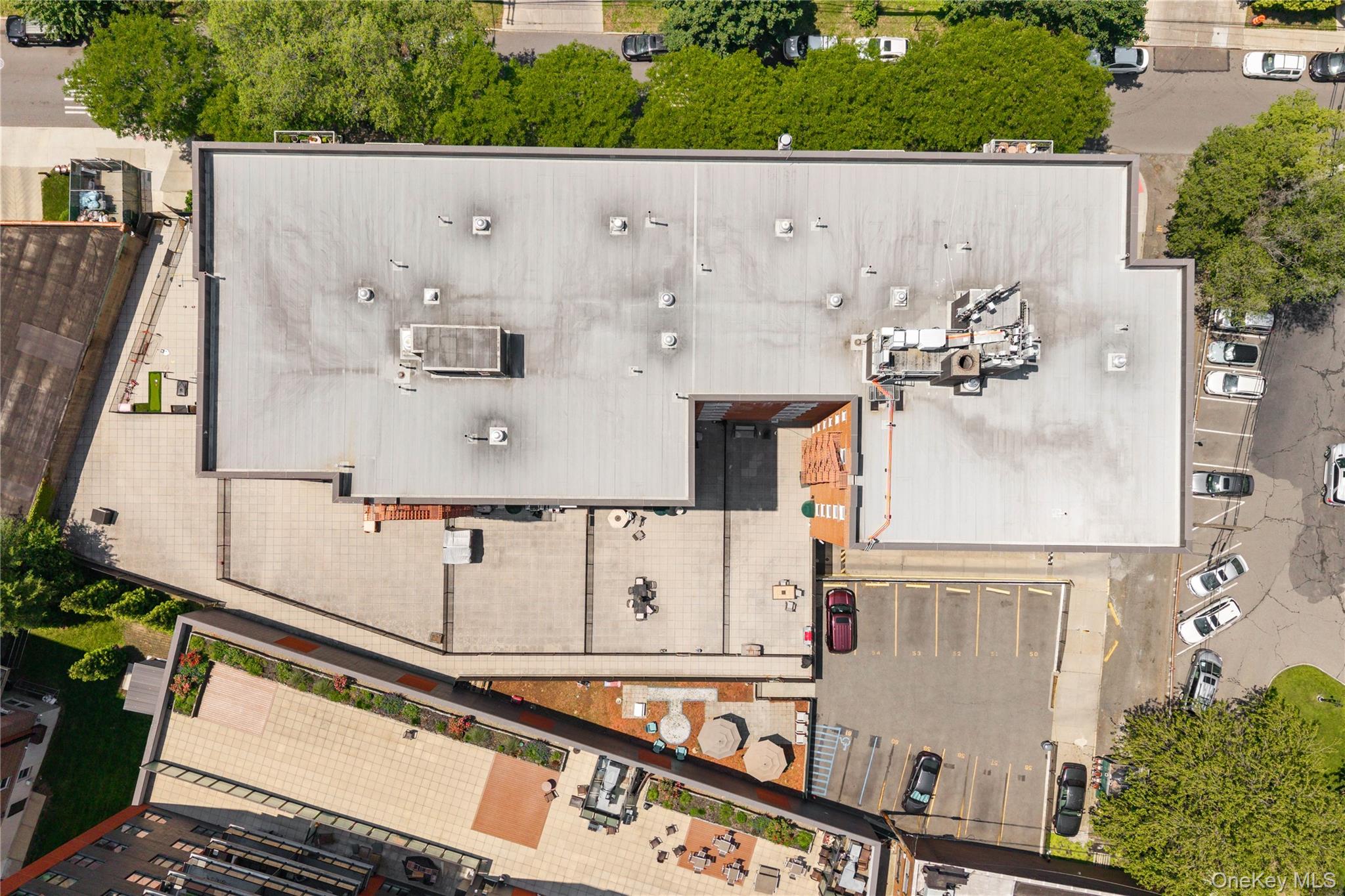 2736 Independence Avenue, Unit 4A Bronx, NY 10463 - Photo 28 of 31 an aerial view of residential house with stairs and trees around