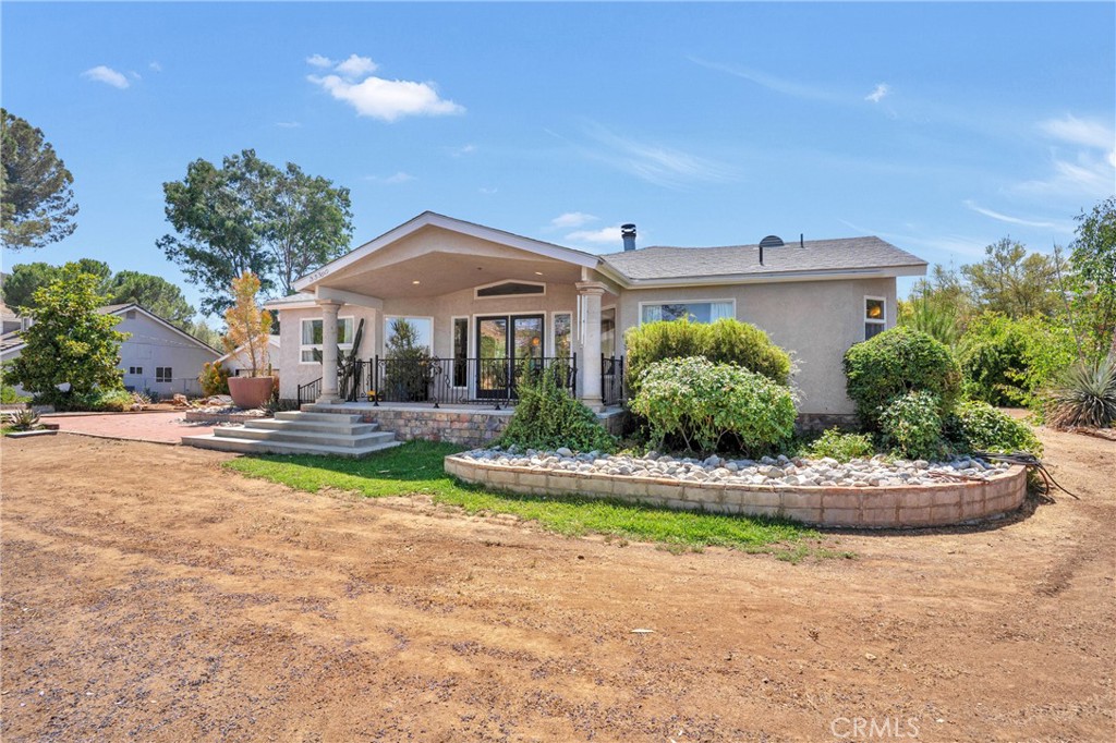 33360 Wright Road Menifee, CA 92584 - Photo 1 of 1 a front view of a house with a yard