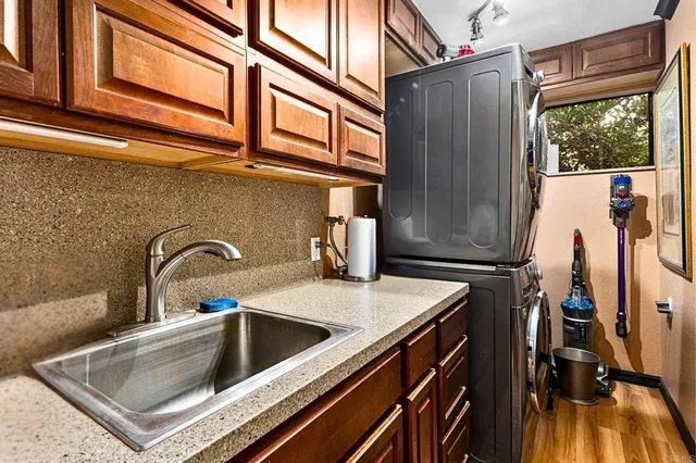 a bedroom with a large bed and a large window