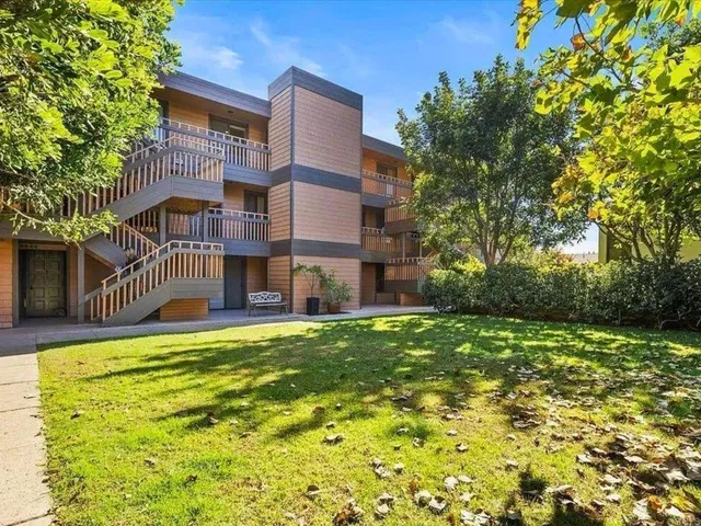 swimming pool view with a seating space