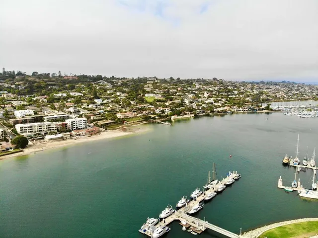 a kitchen with stainless steel appliances a stove microwave and cabinets