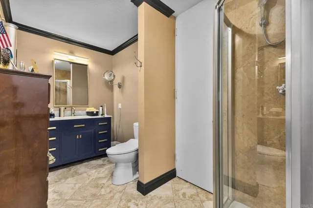 a kitchen with stainless steel appliances a refrigerator and cabinets