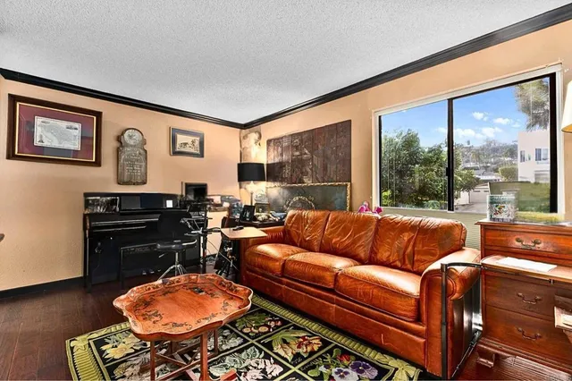 a view of balcony with furniture