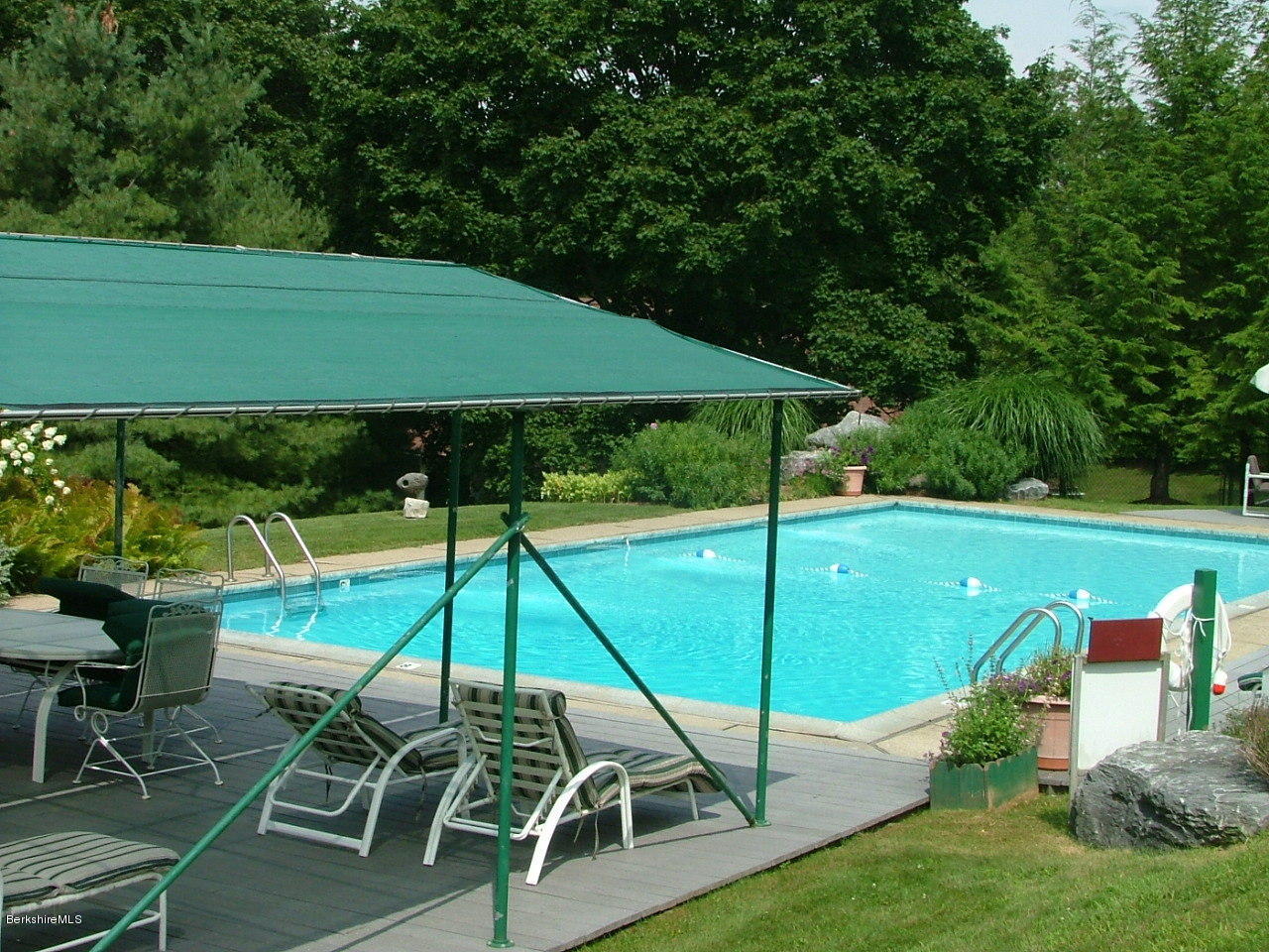 11 Prospect Hill Road, Unit B Stockbridge, MA 01262 - Photo 12 of 13 a view of a swimming pool with a patio