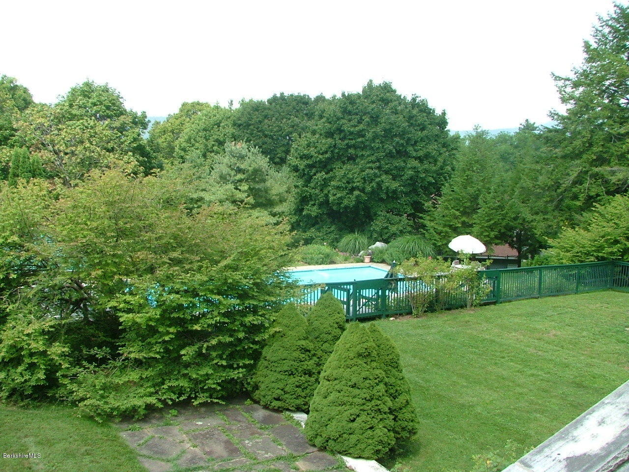 11 Prospect Hill Road, Unit B Stockbridge, MA 01262 - Photo 13 of 13 a view of a garden with a fountain