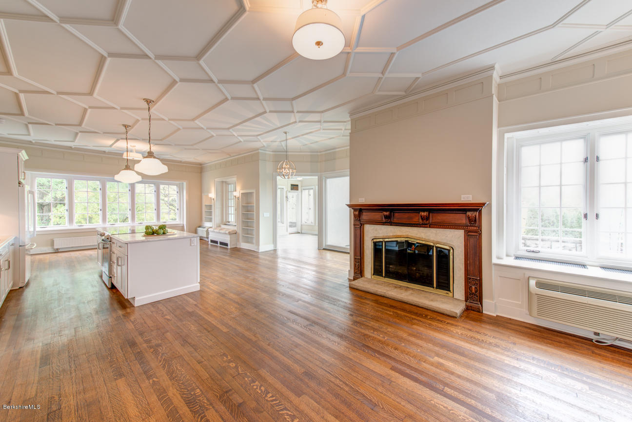 11 Prospect Hill Road, Unit B Stockbridge, MA 01262 - Photo 5 of 13 a view of an empty room with wooden floor and a window