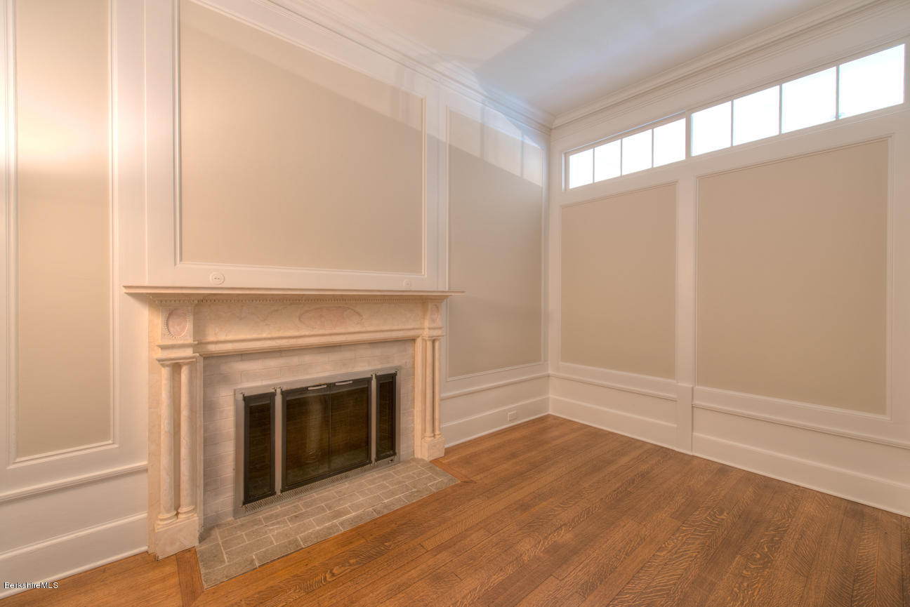 11 Prospect Hill Road, Unit B Stockbridge, MA 01262 - Photo 6 of 13 a view of an empty room with wooden floor and a window