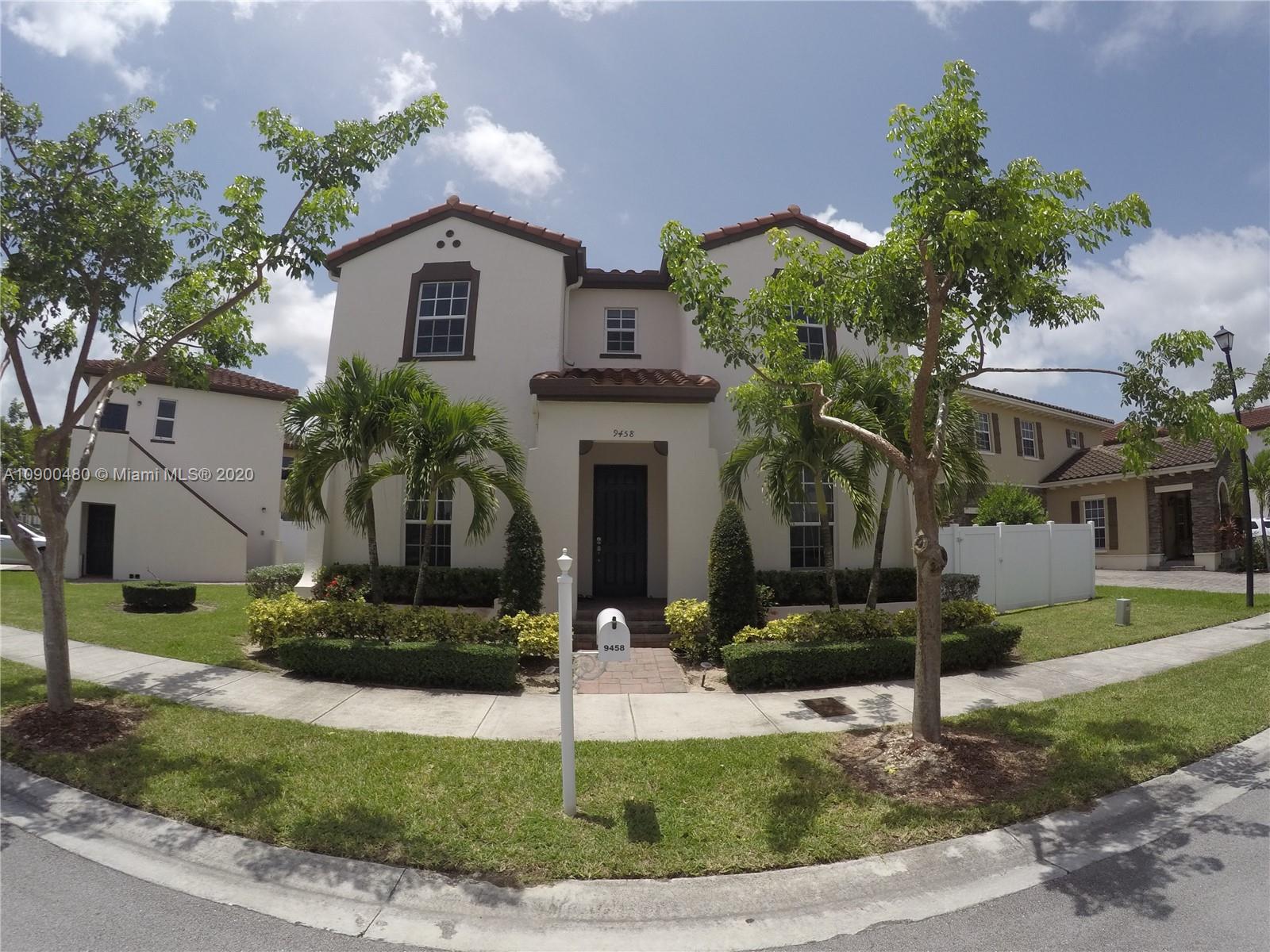 9458 Southwest 170th Path Miami, FL 33196 - Photo 1 of 97 Main house and on the left the detached 2 car garage with the studio apt on the top.