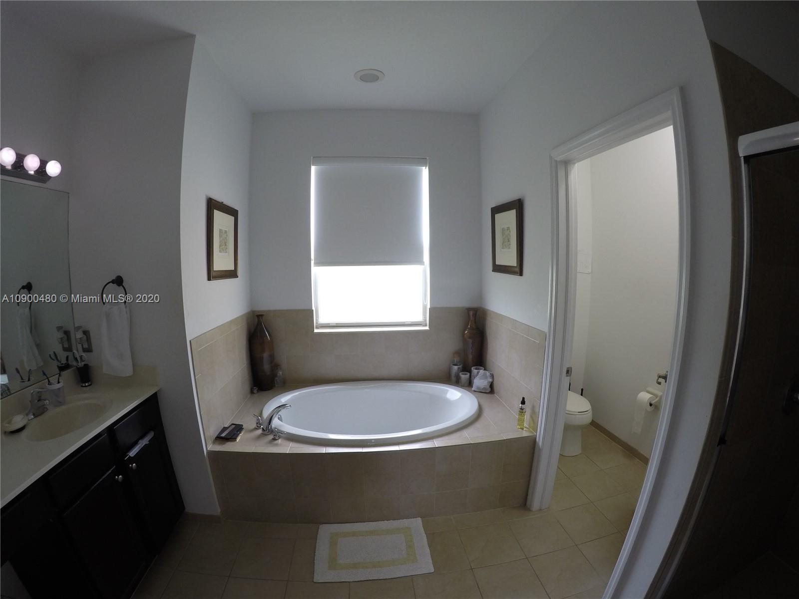 9458 Southwest 170th Path Miami, FL 33196 - Photo 35 of 97 Master bathroom.