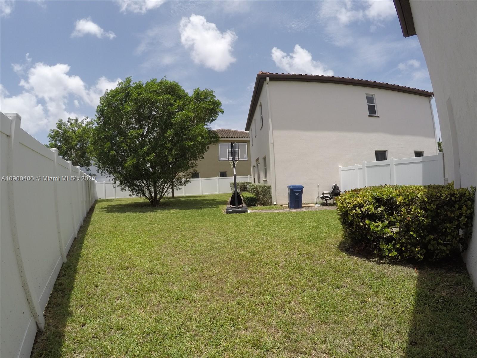 9458 Southwest 170th Path Miami, FL 33196 - Photo 55 of 97 Patio angle from the studio corner looking to the main house.