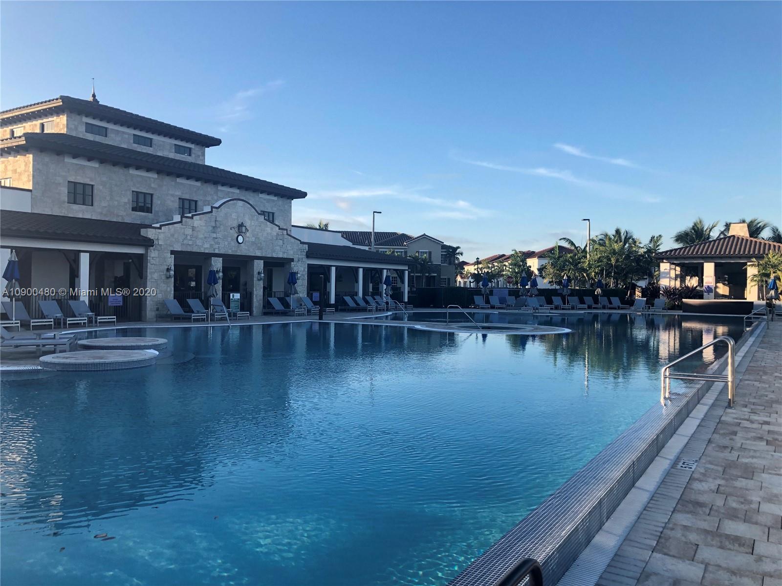 9458 Southwest 170th Path Miami, FL 33196 - Photo 7 of 97 Clubhouse infinity pool. Waling distance to the House.