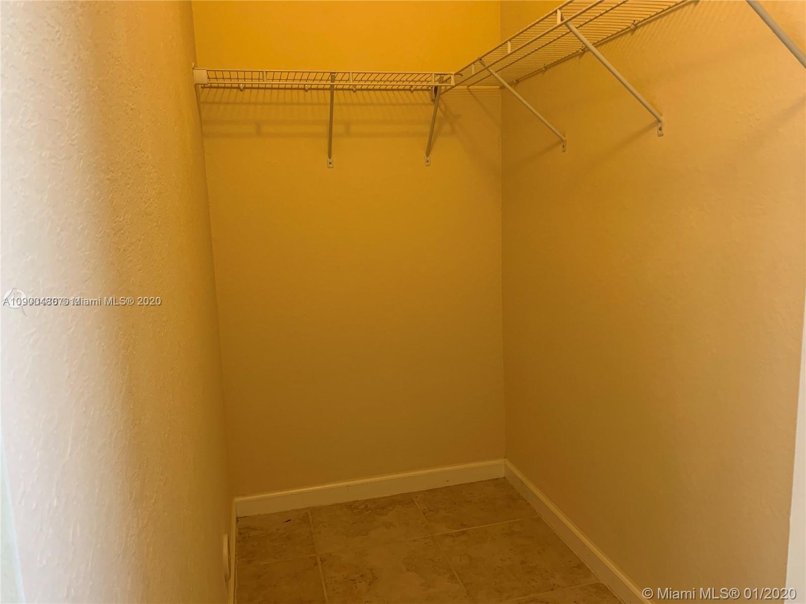 9458 Southwest 170th Path Miami, FL 33196 - Photo 72 of 97 Studio walking closet