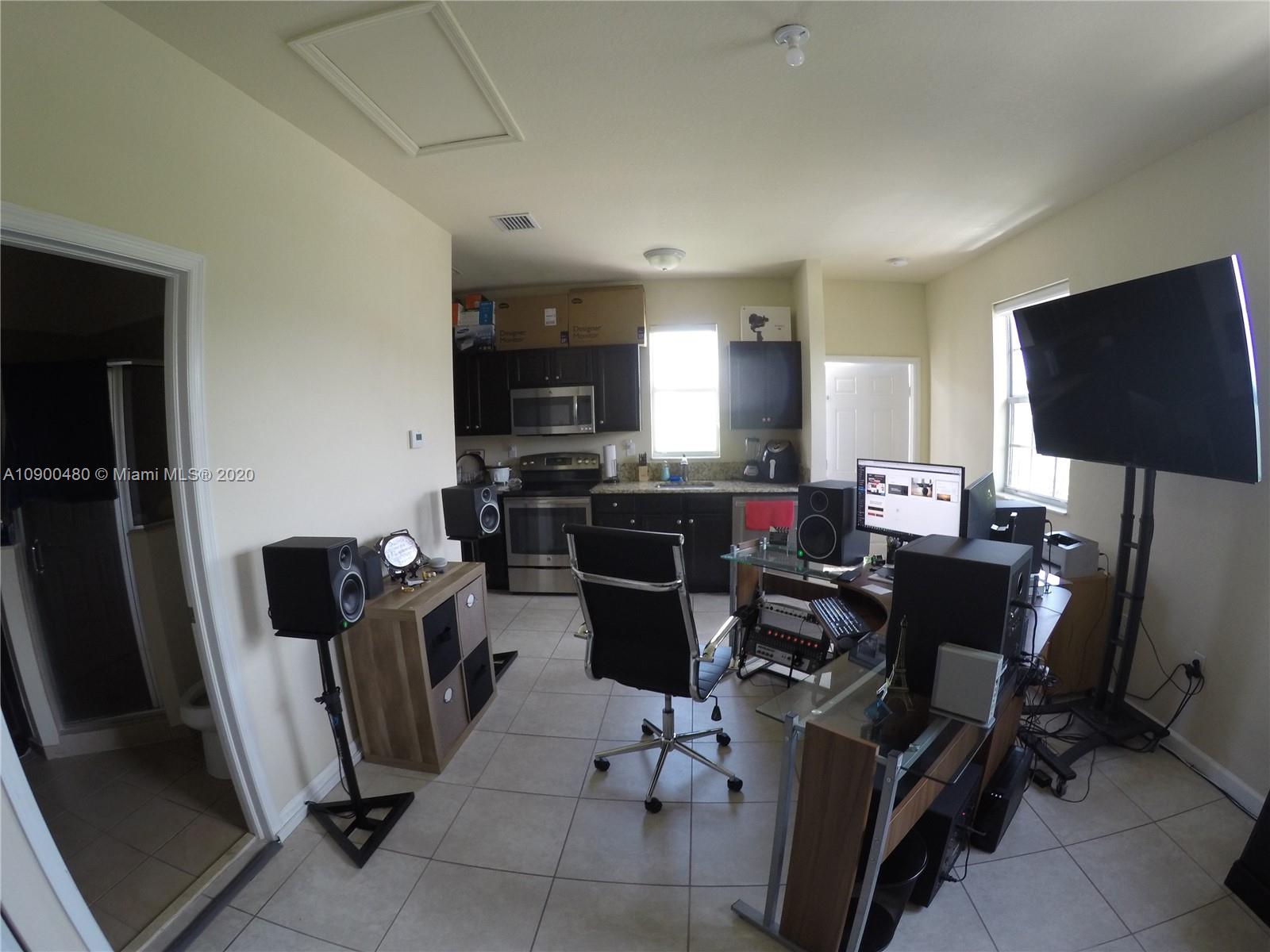 9458 Southwest 170th Path Miami, FL 33196 - Photo 10 of 97 Studio apt with full kitchen, washer and dryer, walking closet and bathroom with shower.