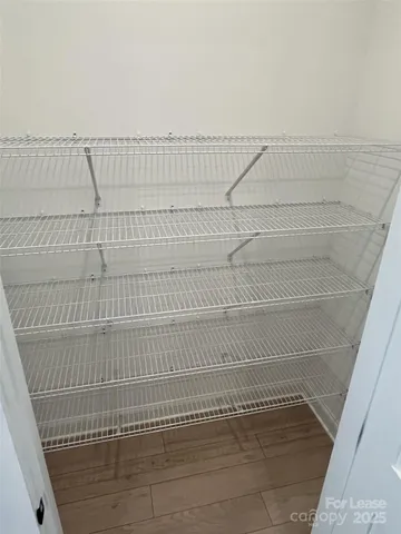 a kitchen with a sink cabinets and window