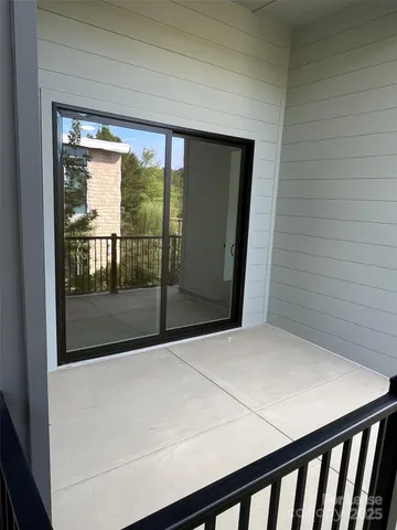 a view of a big room with wooden floor