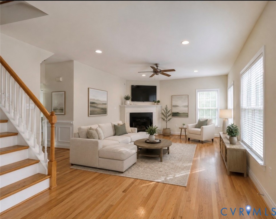 11385 Winding River Road Providence Forge, VA 23140 - Photo 2 of 43 a living room with furniture fireplace and a large window
