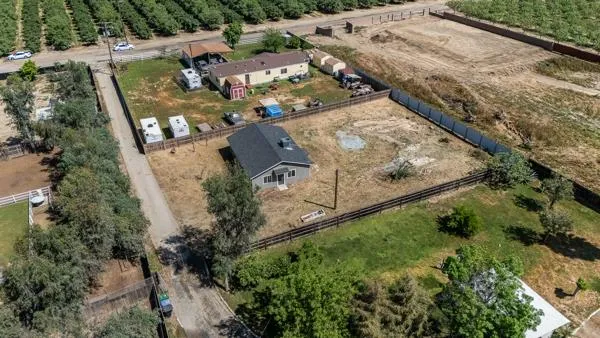 an aerial view of a yard with outdoor space