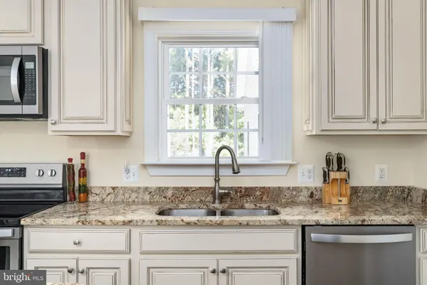 a view of a dining room kitchen and a window