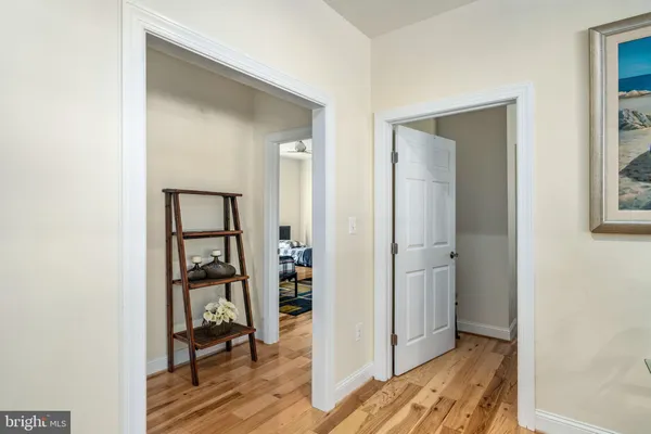 a view of a patio with a table and chairs