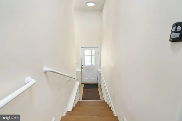 a view of a house with a yard and garage