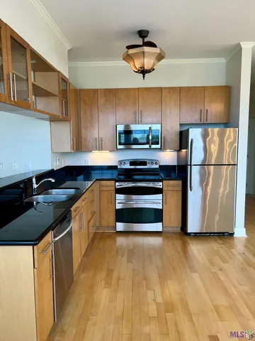 $290,000 | 7707 Bluebonnet Boulevard, Unit 310A, St. George, LA 70810