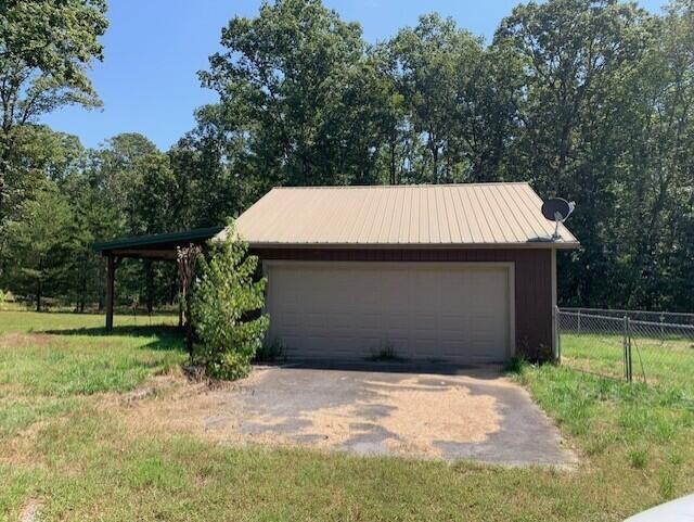 650 Howard Road Decatur, TN 37322 - Photo 5 of 20 a view of a backyard of the house