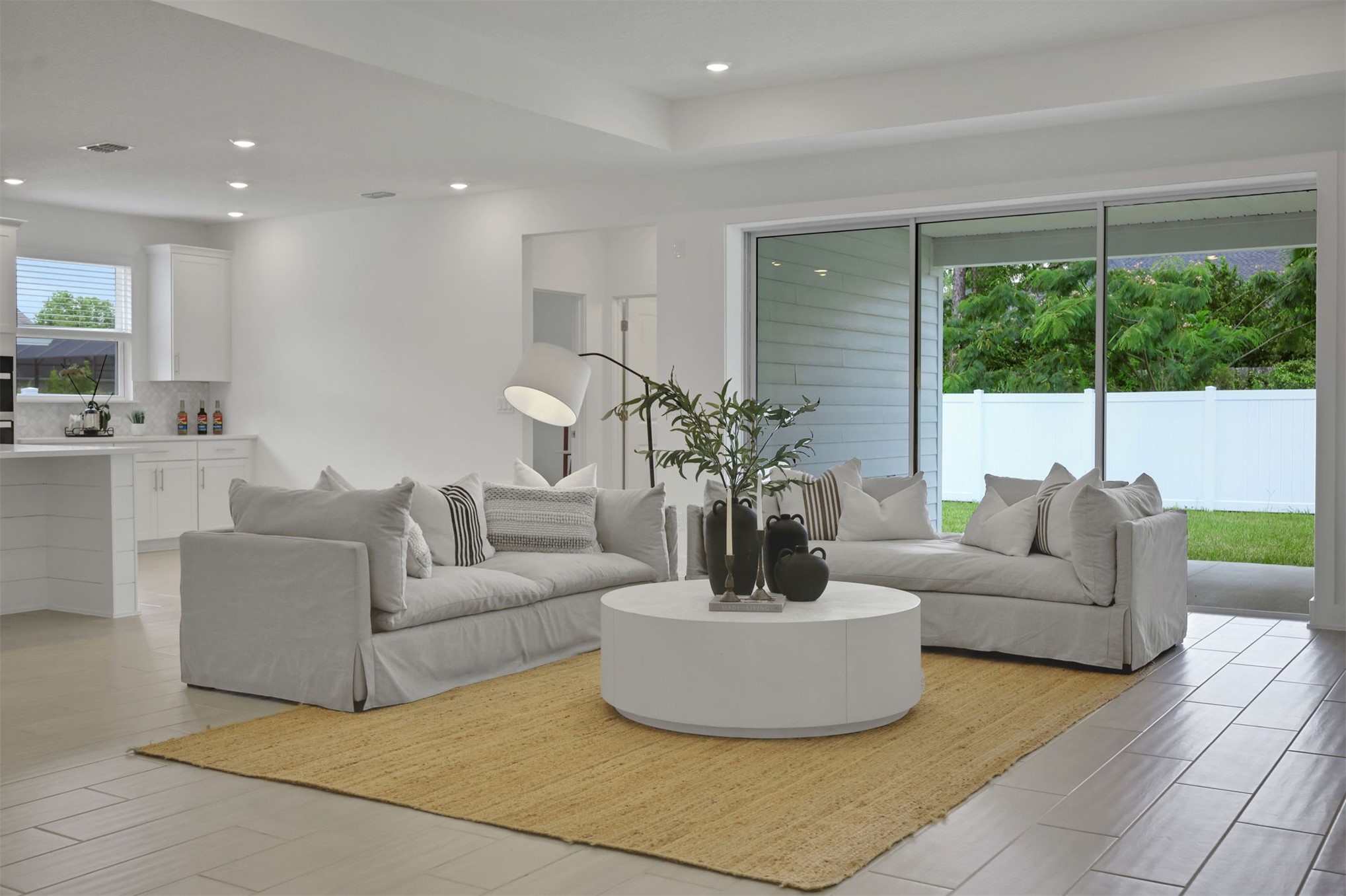 96040 Pirates Bluff Road Yulee, FL 32097 - Photo 12 of 38 a living room with furniture and a large window