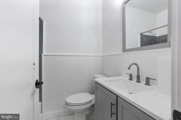 a bathroom with a sink and a toilet