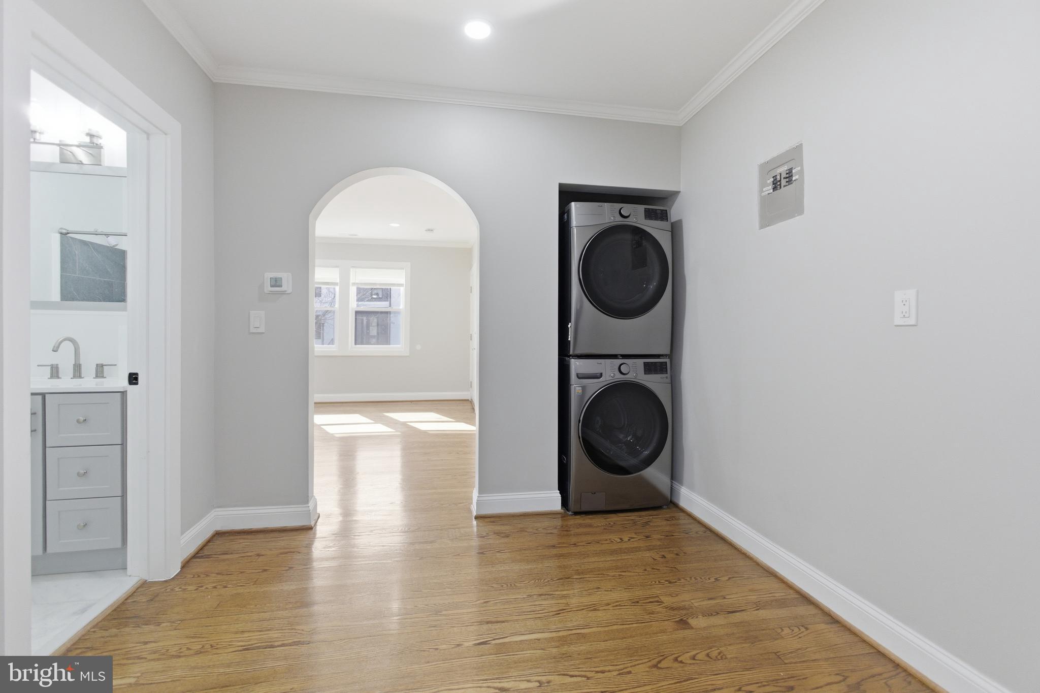 1250 Holbrook Terrace Northeast, Unit 3 Washington, DC 20002 - Photo 12 of 12 a view of a hallway with washer and dryer