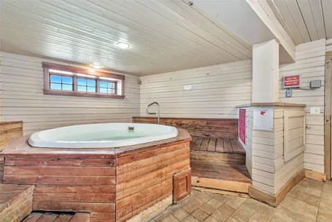 a view of a room with white walls