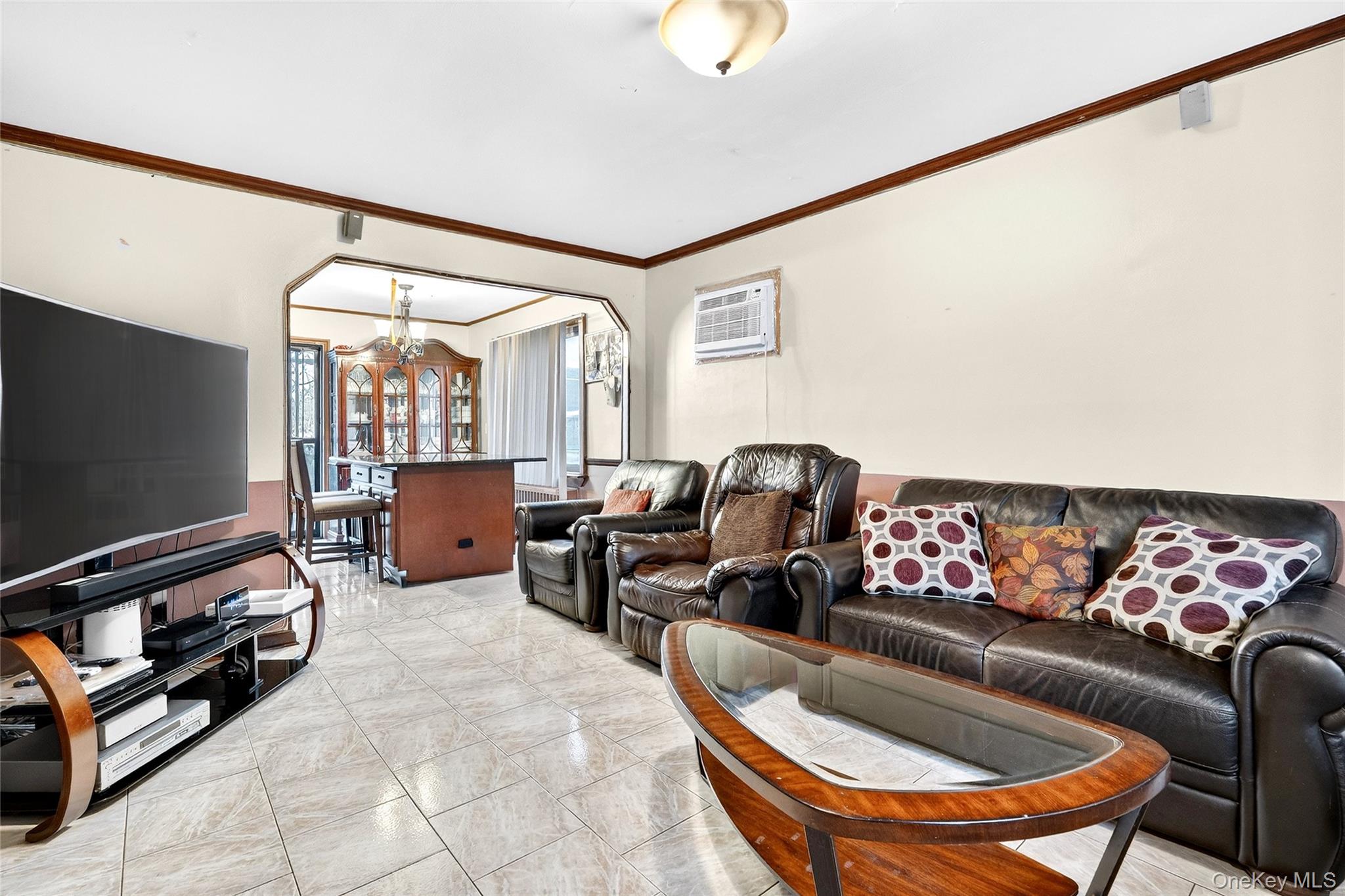 3062 Harding Avenue Bronx, NY 10465 - Photo 15 of 34 a living room with furniture and a flat screen tv