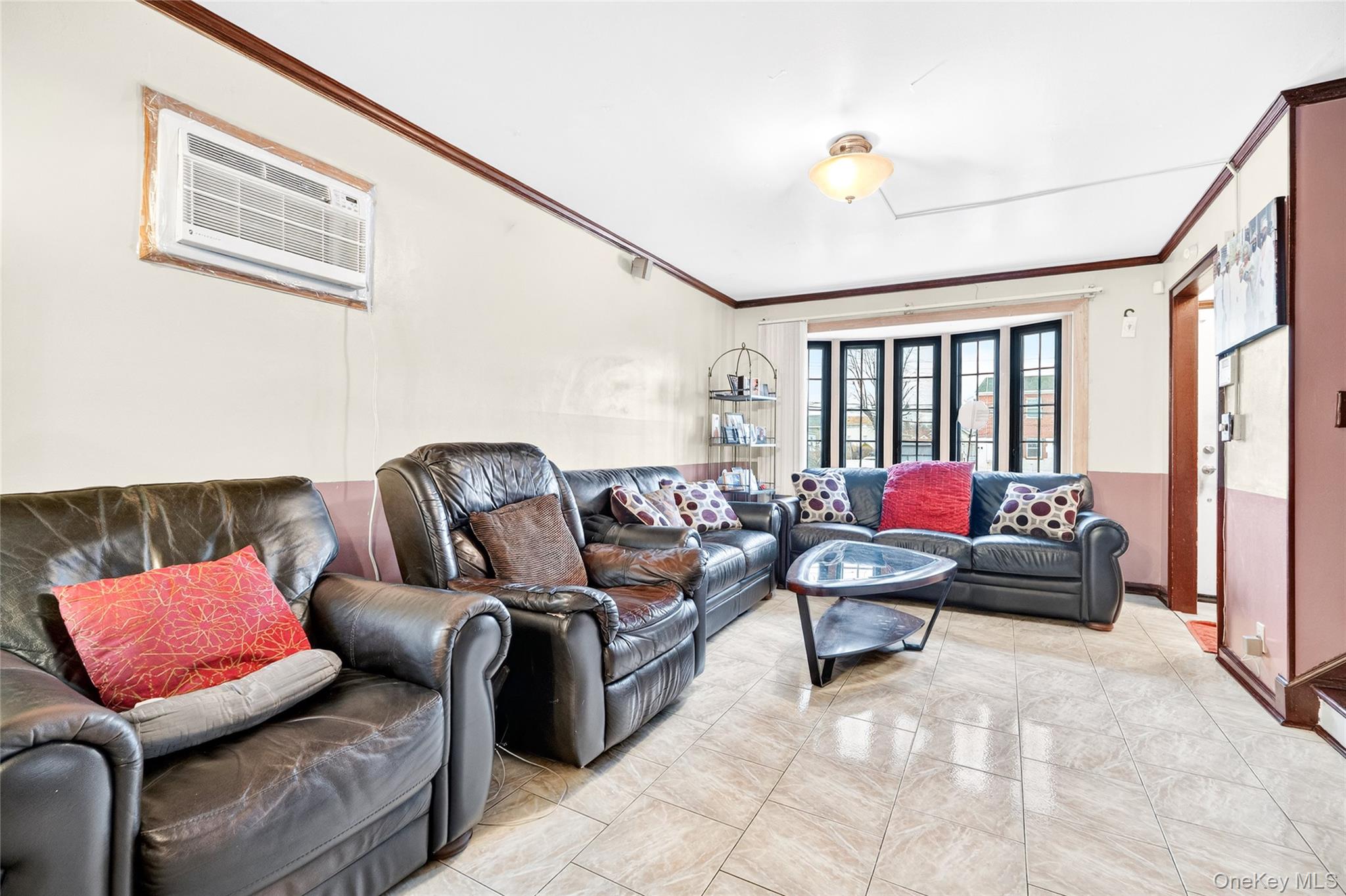 3062 Harding Avenue Bronx, NY 10465 - Photo 16 of 34 a living room with furniture and a large window