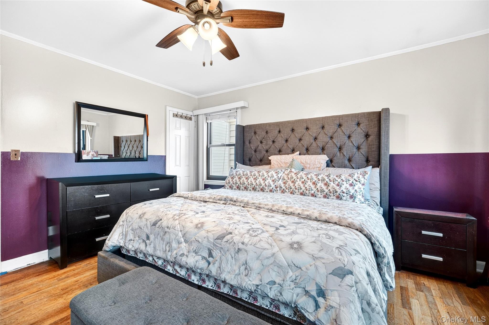 3062 Harding Avenue Bronx, NY 10465 - Photo 22 of 34 a bedroom with a bed and a dresser