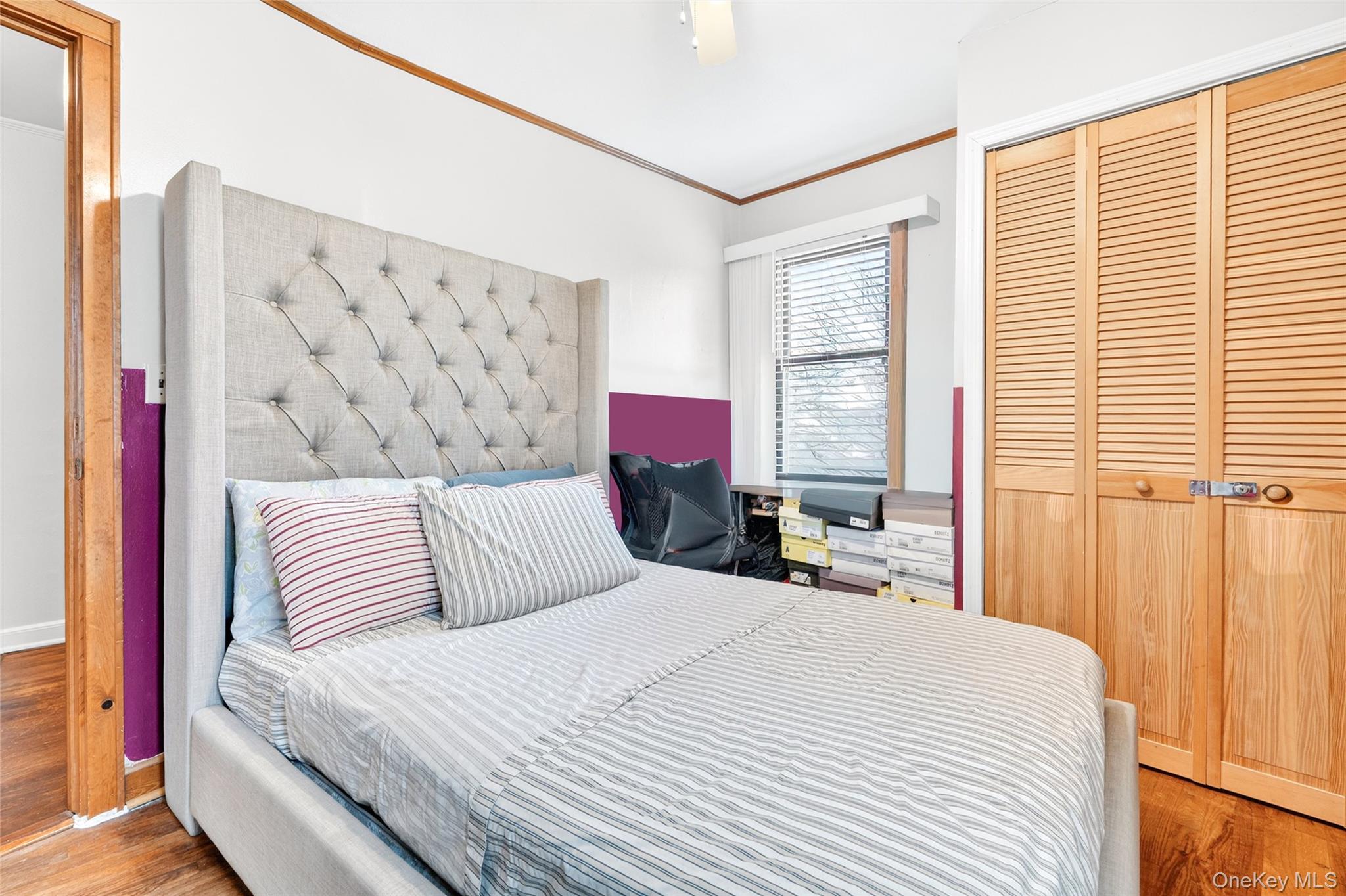 3062 Harding Avenue Bronx, NY 10465 - Photo 25 of 34 a bedroom with a large bed and a window