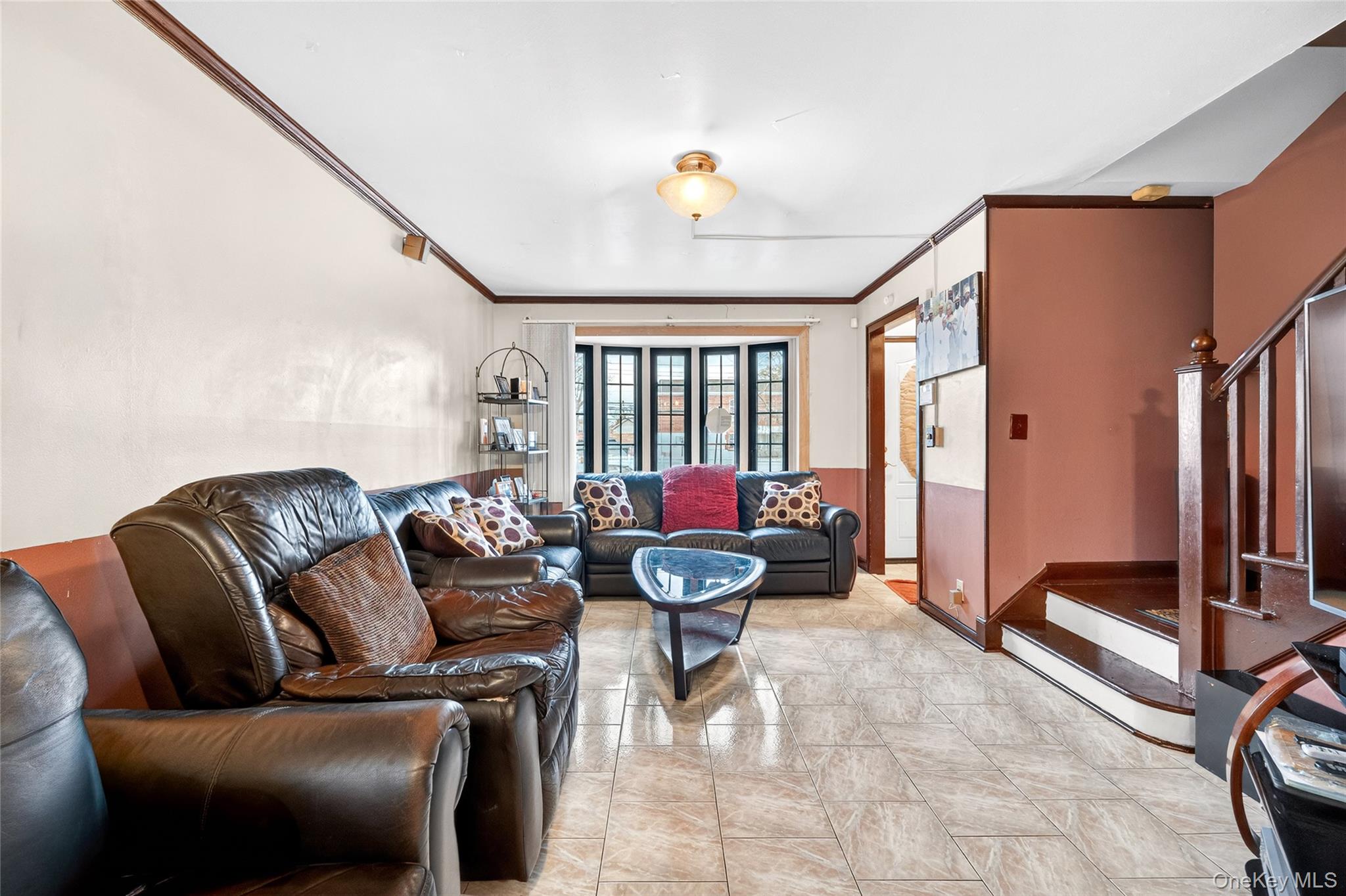 3062 Harding Avenue Bronx, NY 10465 - Photo 4 of 34 a living room with furniture and a large window