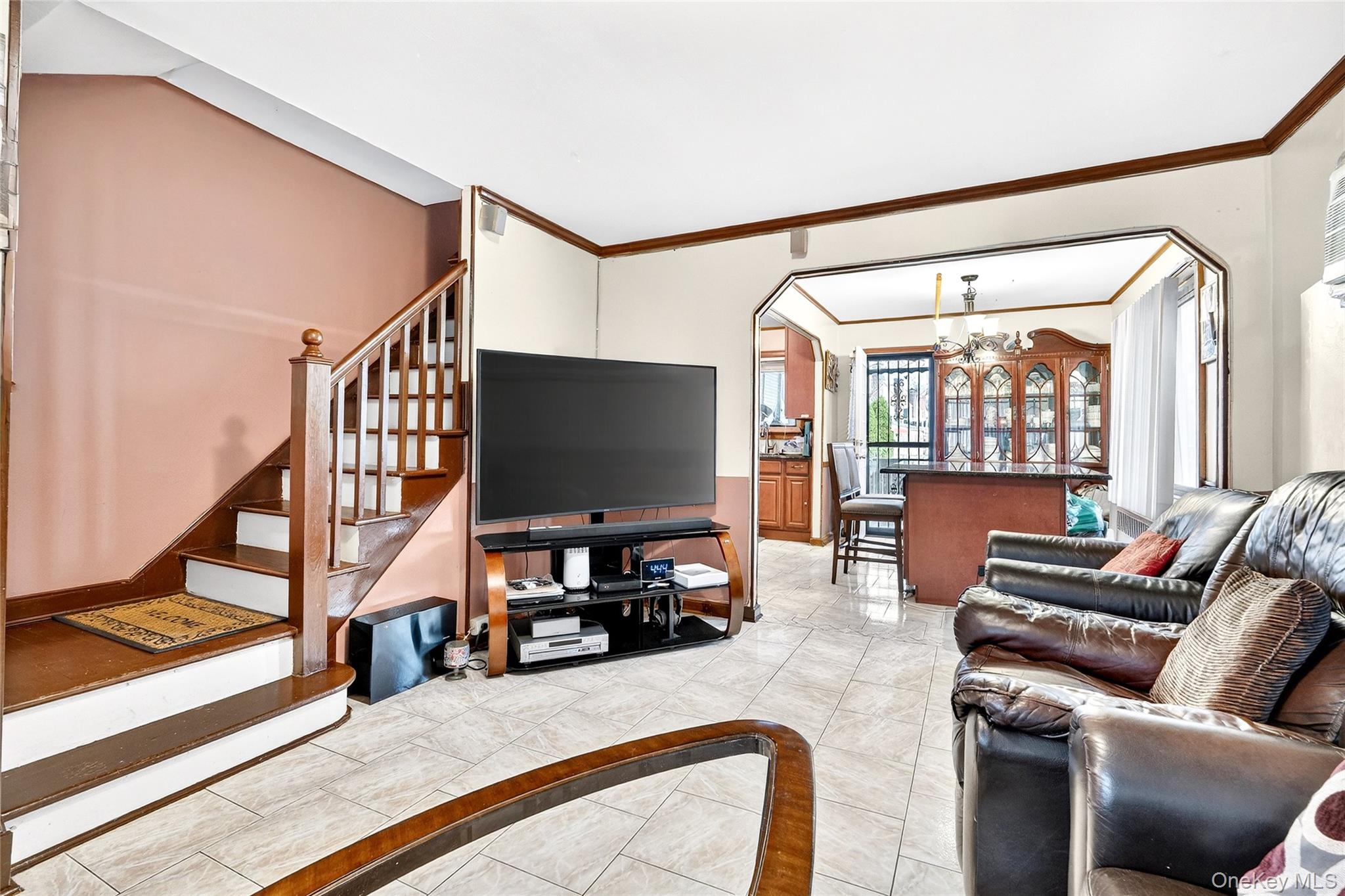 3062 Harding Avenue Bronx, NY 10465 - Photo 5 of 34 a living room with furniture and a flat screen tv
