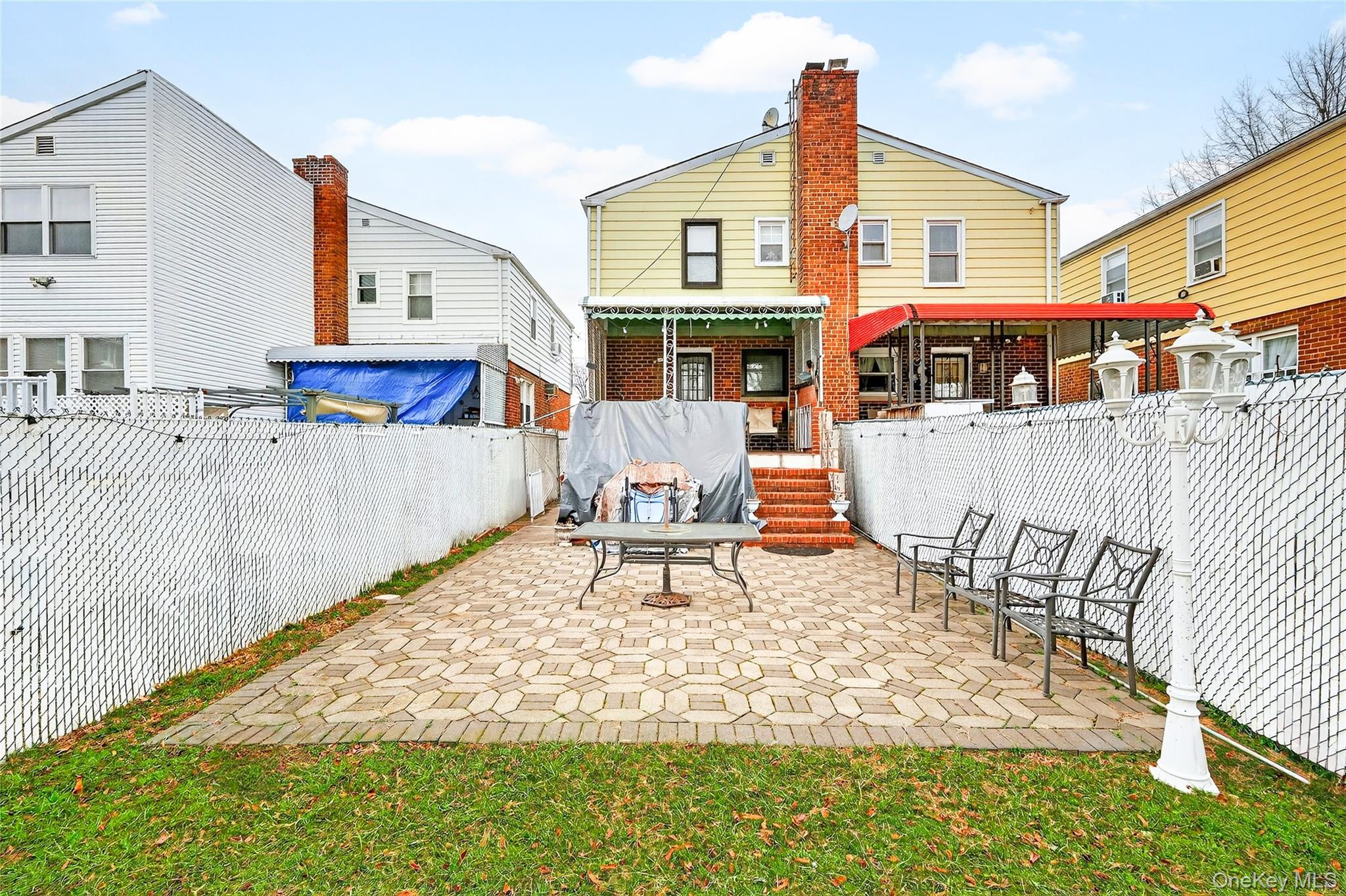 3062 Harding Avenue Bronx, NY 10465 - Photo 9 of 34 a view of a house with backyard and sitting area